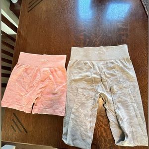 Women’s AYBL pink biker shorts and light grey leggings